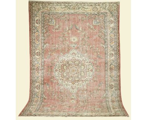 A vintage Anatolian handmade woollen rug, 280 x 187cm.