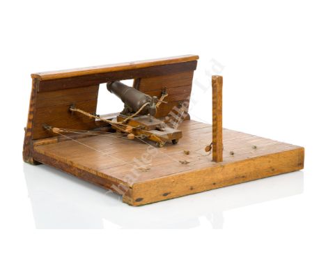 A 19TH CENTURY SECTION MODEL OF A CARRONADE SETTING ABOARD A SHIP OF THE LINE the hull planked in contrasting woods and pinne