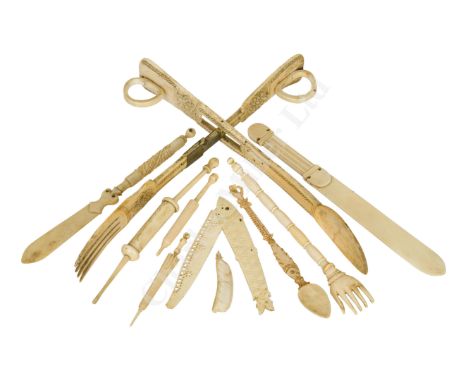 AN EARLY 19TH CENTURY FRENCH NAPOLEONIC PRISONER-OF-WAR PAIR OF BONE SALAD SERVERS, CIRCA 1800 carved overall, the fork with 