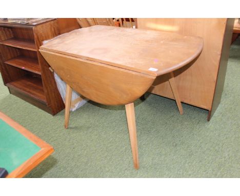 Ercol Blonde Elm Drop leaf dining table on splayed legs 