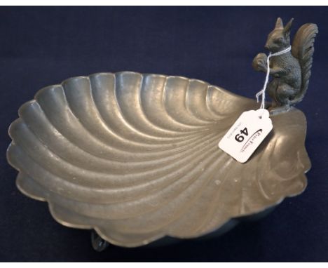 Beaten pewter shell shaped dish with squirrel mount, stamped A.P Morgan Swansea.Oxidised brass gas lamp lacking shade. (B.P. 
