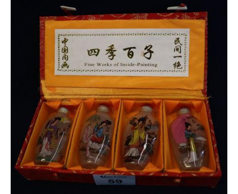 Four modern Chinese interior painted glass snuff bottles, original box. (4)(B.P. 24% incl. VAT)