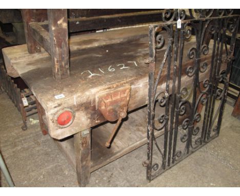 Large rustic work bench with under tier and vice.(B.P. 24% incl. VAT)