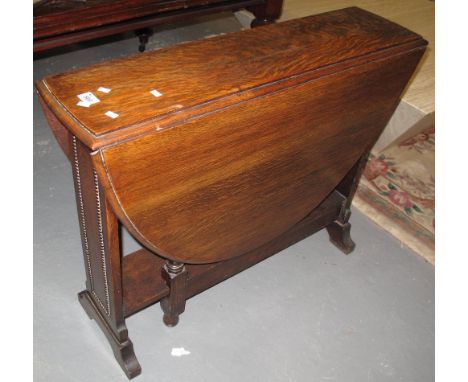 Early 20th Century oak gate legged table with beaded decoration and barley twist supports. (B.P. 24% incl. VAT)