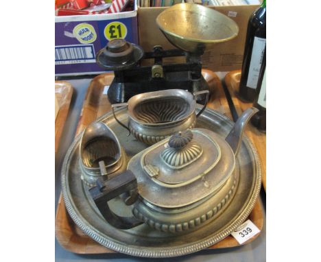 Three piece silver plated fluted tea service, together with a plated tray and cast iron scales with two weights. (B.P. 24% in