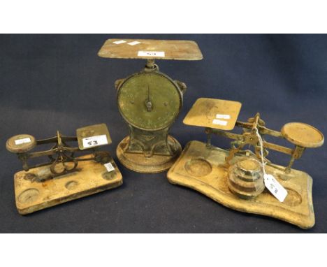 Two sets of brass postal scales on wooden bases, together with a set of Salters platform postal scales. (3)(B.P. 24% incl. VA