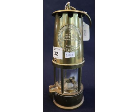 Protector lamp and lighting Company Ltd brass miner's safety lamp (unused).(B.P. 24% incl. VAT)
