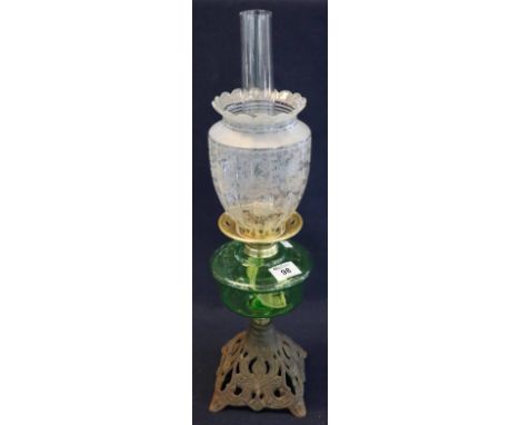 Early 20th Century brass burner oil lamp with glass reservoir on cast metal base, etched glass shade and clear chimney. (B.P.