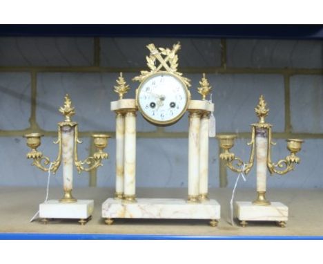 19th century French three piece mantel clock garniture comprising clock with eight day movement, signed - F. E. with white en