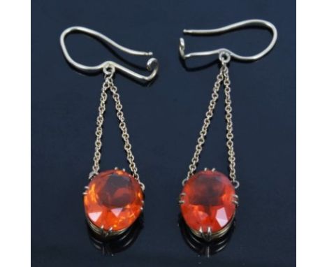 Pair early 20th century fire opal pendant earrings with an oval mixed cut orange fire opal measuring approximately 12mm x 10m