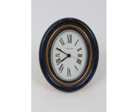 Cartier travelling alarm clock with white oval dial, with Roman numerals and subsidiary alarm hand, signed - Cartier Paris, i