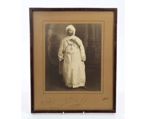 Sultan Yusef of Morocco (reigned 1912 - 1927), rare signed presentation portrait photograph of the Sultan, wearing the Britis