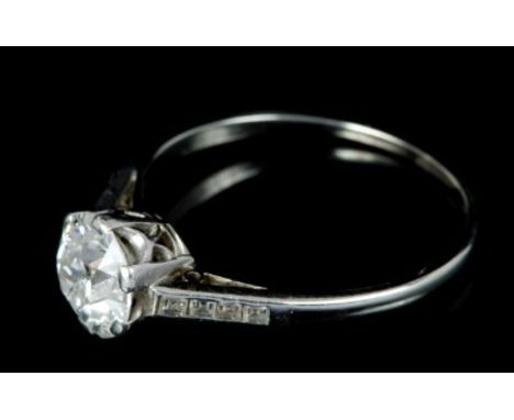 Art Deco diamond single stone ring with an old cut diamond estimated to weigh approximately 1.25 carats, in eight claw settin