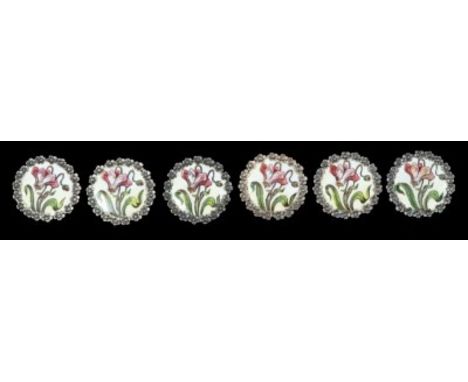 Set six Art Nouveau buttons, each with a polychrome enamel floral panel with a flower-head border, 24mm diameter