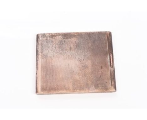 1930s silver cigarette case of rectangular form, with engine-turned decoration and interesting spring opening with gold thumb