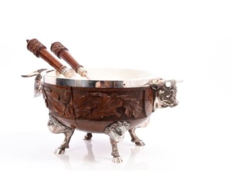 Unusual early 20th century carved oak salad bowl of circular form, with carved oak decoration and silver plated rim, twin sil