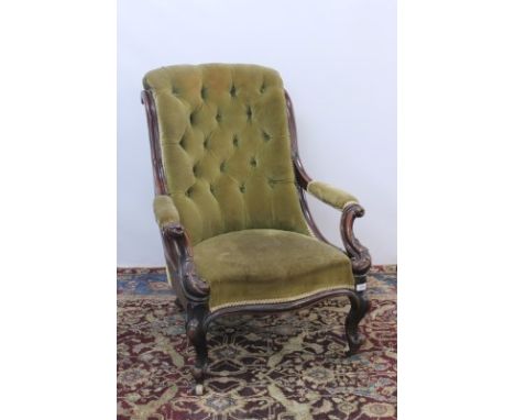 Good quality Victorian mahogany framed easy chair with buttoned green upholstery, scroll arms and cabriole front legs termina