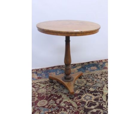 Regency pollarded oak wine table with circular top on turned column and trefoil base with fluted turned feet, 60cm diameter C