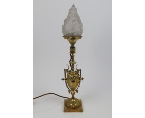 Decorative small oil lamp, converted for electricity, with shade, the urn shaped body with a pair of angular handles, raised 