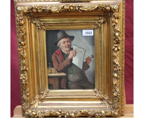 F. Behrens, 19th century oil on canvas - figure smoking a pipe and reading the paper, in glazed gilt frame, 22.5cm x 17.5cm