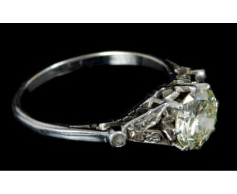 Art Deco diamond single stone ring with an old cut diamond estimated to weigh approximately 1.30 carats, in eight claw settin