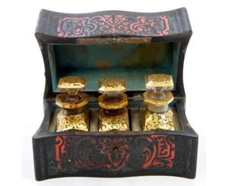 19th century French Boulle work perfume box, serpentine fronted with concave sides, opening to reveal three glass bottles and