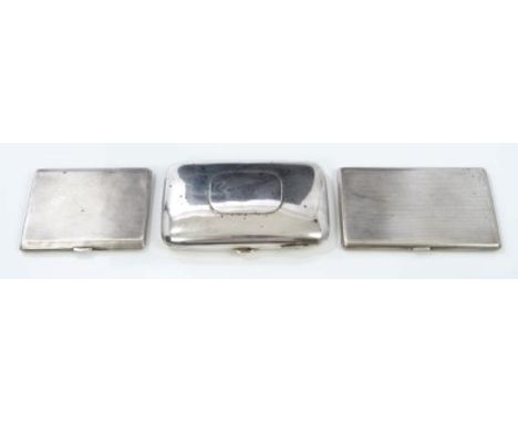 Edwardian silver cigar case of shaped rectangular form, with vacant cartouche (Chester 1905), together with a 1930s silver ci