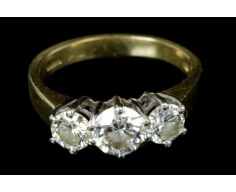 Diamond three stone ring with three brilliant cut diamonds, the central stone estimated to weigh approximately 0.85 carats, f