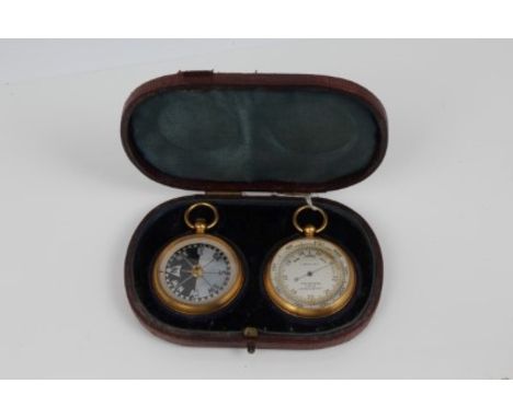 Cased barometer and compass each in gilt metal cases, the barometer with retailer's marks Curry & Paxton, London, Liverpool a