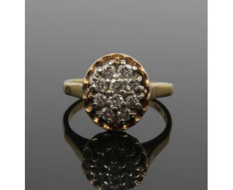 Gold (18ct) diamond cluster ring with an oval cluster of ten brilliant cut diamonds on gold (18ct) shank.  Ring size L  CONDI