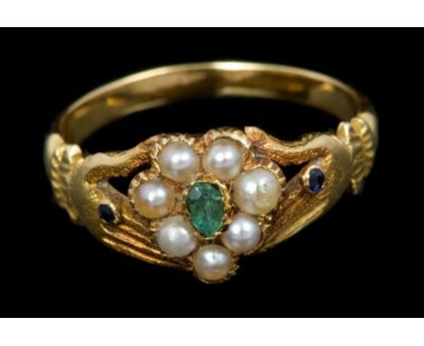 Regency emerald and seed pearl Friendship ring with a heart-shape cluster centred with a pear cut emerald surrounded by seven