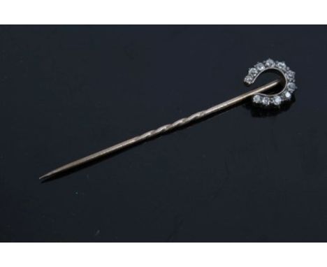 Victorian diamond stick pin with a horseshoe motif set with eleven graduated old cut diamonds in silver collet setting, 11mm 