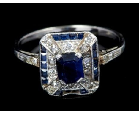 Art Deco sapphire and diamond cluster ring - the rectangular plaque with central step cut blue sapphire with old cut and sing