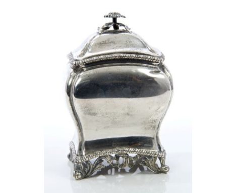 Victorian silver tea caddy of bombe form, with gadrooned border, detachable domed cover with flower-head finial, on a foliate