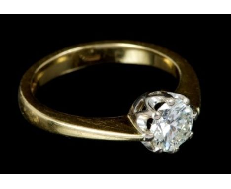 Diamond single stone ring with a brilliant cut diamond estimated to weigh approximately 1.00 carat, in eight claw setting on 