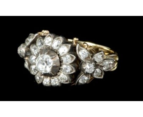 Fine Victorian diamond cluster ring, the flower-head cluster with a central collet set old cut diamond surrounded by old cut 