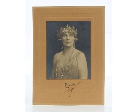HM Queen Ena of Spain - signed portrait photograph of The Queen wearing a diamond crown and jewels, signed and dated in ink o