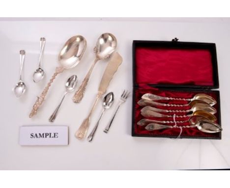 Collection of silver and white metal spoons and other flatware, including an Edwardian silver anointing spoon with Cavalier t