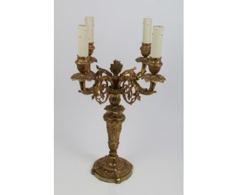 Good late 19th century four-branch gilt metal French-style table light, each with shaped sconces with leaf decoration, scroll