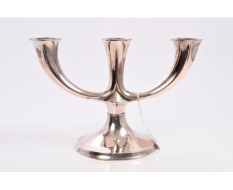 Early 20th century German silver three-branch candlestick on a circular pedestal base, with German marks and stamped - 835.  