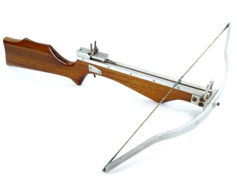 A mahogany and aluminum crossbow.