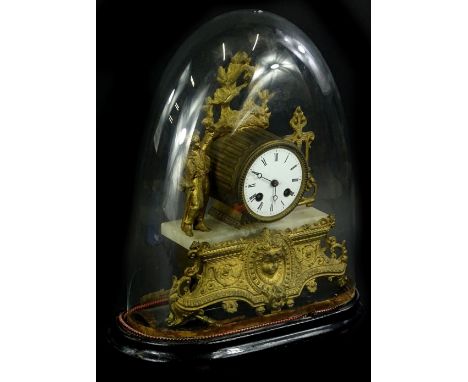 A late 19thC mantel clock, in oak metal case, with 8cm dia Roman Numeric dial revealing an eight day key wind movement, flank