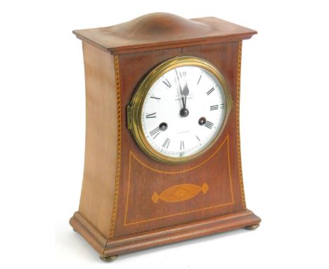 An Edwardian mahogany and marquetry mantel timepiece, the enamel dial bearing name George Tarratt Market Street Leicester, th