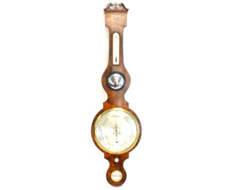 J. Smith. A mid 19thC mahogany cased aneroid barometer, with brass dry damp gauge thermometer and engraved dial, stamped J Sm