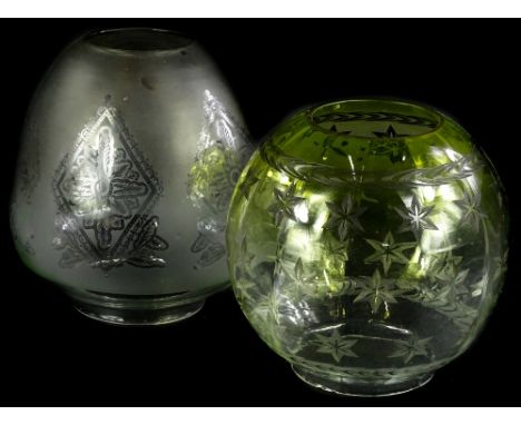 A Victorian part vaseline glass globular lamp shade, decorated with stars etc., (AF) 18cm H, and a frosted and etched glass s