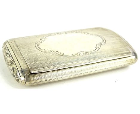 A Victorian silver snuff box, with engine turned decoration, the hinged lid with a vacant cartouche, enclosing a gilt interio