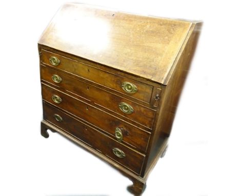 A George III mahogany bureau, the fall enclosing a fitted interior, above four graduated drawers with later handles, on brack