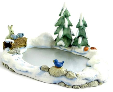 A Goebel Icy Adventure stand, in original box.