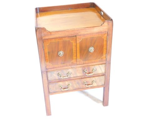 A George III mahogany night commode, with two rosewood cross banded doors, and two drawers on chamfered legs, 52cm W.