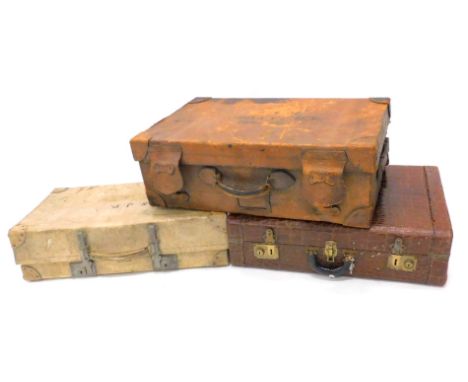 A collection of cases, to include a simulated brown crocodile skin case, possibly for a vintage car, a larger brown suitcase 